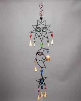 These Celestial Chime with glass Beads chime hanging are sure to make a fantastic addition to your home decor adding a lot of color in any given room, and spreading a very positive and joyous vibe.<br><br><br>It's handmade by the artisans using metal scraps, and thus it is very sustainable. Many of our customers love to use it as a decorative wall hanging.<br><br>Size:<br>Height: 23"<br><br>Width: 7"<br><br>Drop: 5"<br><br><br>Material: Iron with Tin Bells and<br>Glass Beads