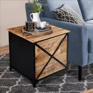 Emanating a bold, rustic appeal, this trunk end side table from our Daz collection is sure to add a unique character to your interior Decor. Featuring a lift top storage space that can be accessed from the both sides, the metal hinges facilitate smooth opening and closing. Handcrafted from water resistant mango wood, metal sheet, and cast iron for lasting use, the cross metal trim and rivet accents impart a confident and charming aesthetic. The natural brown wood finish goes perfectly well with 