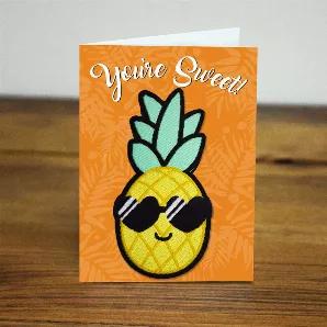 Embroidered iron-on patch is approximately 1 x 2 1/2" and comes on a cute mini card.