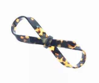 <p>Oversized Large Hand Tied Bow    Tying Handmade  Celluloid Acetate Got Us This Loop</p><br><tr><th>Material:</th><td>Celluloid </td></tr><br><tr><th>Manufacturer:</th><td>French</td></tr><br><tr><th>Hand made plastic:</th><td>No</td></tr><br><tr><th>Hand painted:</th><td>No</td></tr> <tr><th>Style:</th><td>Day/Evening</td></tr>  <tr><th>Size:</th> <td>Large</td></tr> <tr><th>Width (Inches):</th> <td>3.5</td></tr> <tr><th>Style #:</th> <td>2385</td></tr>