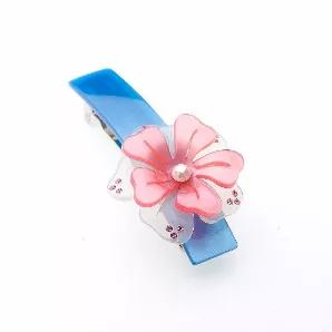 <p>Blossoming  Flower Three (3) Ply Engraved Flower And Sprinkled With 15 Colored Rhine Stones And Pearl Stud</p><br><tr><th>Material:</th><td>Celluloid </td></tr><br><tr><th>Manufacturer:</th><td>French</td></tr><br><tr><th>Hand made plastic:</th><td>Yes</td></tr><br><tr><th>Hand painted:</th><td>No</td></tr> <tr><th>Style:</th><td>Day/Evening</td></tr>  <tr><th>Size:</th> <td>Large</td></tr> <tr><th>Width (Inches):</th> <td>1</td></tr> <tr><th>Style #:</th> <td>1425</td></tr>