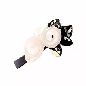 <p>Pearl and black hair barrette with Swarovski crystals. Engraved and twirled pearl roses and black leaves. A lovely combination with 19 rhinestones and studs on tight Swarovski barrette.</p>    <br><tr><th>Material:</th><td>Acrylic</td></tr><br><tr><th>Manufacturer:</th><td>Asia</td></tr><br><tr><th>Hand made plastic:</th><td>Yes</td></tr><br><tr><th>Hand painted:</th><td>No</td></tr> <tr><th>Style:</th><td>Day/Evening</td></tr> <tr><th>Size:</th> <td>Ex-Large</td></tr> <tr><th>Width (Inches):