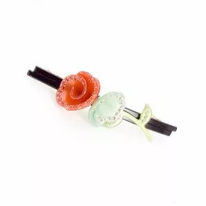 <p>Hand Turning Mint And Peach Produced A Flower Jewel It With 50 Rhinestones And Studs You Get A Flower Of Distinction </p><br><tr><th>Material:</th><td>Celluloid </td></tr><br><tr><th>Manufacturer:</th><td>French</td></tr><br><tr><th>Hand made plastic:</th><td>No</td></tr><br><tr><th>Hand painted:</th><td>No</td></tr> <tr><th>Style:</th><td>Day/Evening</td></tr>  <tr><th>Size:</th> <td>Ex-Large</td></tr> <tr><th>Width (Inches):</th> <td>2.25</td></tr> <tr><th>Style #:</th> <td>4531</td></tr>