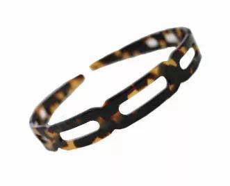<p>Fashionable open square pearlised headband in Tokyo color. Made of <a href="/faq-2.html" title="Celluloid Acetate">celluloid Acetate</a>.</p>    <br><tr><th>Material:</th><td>Celluloid </td></tr><br><tr><th>Manufacturer:</th><td>French</td></tr><br><tr><th>Hand made plastic:</th><td>Yes</td></tr><br><tr><th>Hand painted:</th><td>No</td></tr> <tr><th>Style:</th><td>Day/Evening</td></tr>  <tr><th>Size:</th> <td>Med</td></tr> <tr><th>Width (Inches):</th> <td>3.5</td></tr> <tr><th>Style #:</th> <