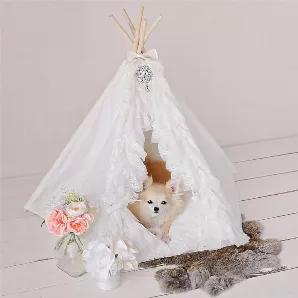 This extravagant luxury Lullaby Teepee handcrafted by Hello Doggie is adorned with delicate cascading lace and embellished with a crystal brooch for that finishing touch of elegance. The Lullaby Teepee is a perfect hideaway for a quiet afternoon nap. Complete with a removable stuffed pillow for extra comfort and tie-backs for opening or closing.