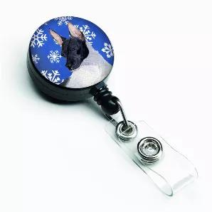 Retractable Badge Reel... Round retractable reel with belt clip on the back. Use for school or work ID or badge. Retractable chord allows you to swipe your badge or ID without removing. Artwork Printed on aluminum and covered with a doming finish.