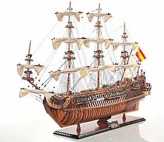 This is an exclusive Open Hull edition of the San Felipe, where the model is fully see through to showcase the artwork of our master craftsmen. The ornaments on her body made her more beautiful than any other ships at her time. Thus, to recapture the beauty of this ship into the model, we have used the most exotic wood that are available, the highest quality brass fittings that we can cast and more than 200 hours to put together this magnificent model. Examples of wood use include mahogany and w