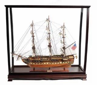 Are you looking for a perfect display combination? Our USS Constitution 38" model and tabletop display case combo will sure to set your home or office apart! The Model: This is Museum-quality, Fully Assembled edition of the famous USS Constitution "Old Ironside". It is part of an exclusive edition where the hull is laser cut with a unique serial number. The model is 100% hand built from scratch using “plank on frame" construction method. Our master craftsmen have spent more than 100 hours to f