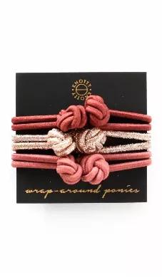 Twist one or more of these hair ties around your updo! Packaged on a card.