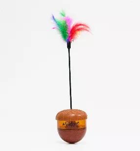 <p></p><p>Petiques Nutty Feline Treat Dispenser was designed to keep your cats healthy, busy and fed! The colorful feathers on the Nutty Feline Treat Dispenser acts like a oeprey. The acorn shaped treat dispenser has a weight on the bottom that makes the treat dispenser wobble back and forth, making your cat have to work for his treats! This is a good thing because a cats natural instinct is to want to capture their food. The cat working for his food, or shall we say hunting, is another form of 