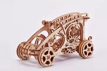 3D wood mechanical puzzle of laser-cut wood pieces that snap together without glue to build a 3D model.  Build, play and display.  Model has wind up so you can make it go!  STEM and building activity.  Kit contains 144 pieces and detailed instructions.<br>
Ploughing through the dirt, with your Buggy bouncing as you hit each patch… not much can beat the fun and excitement of riding in your own Buggy car.<br>
WoodTrick is proud to produce the Buggy wooden model kit, which emulates the design of 