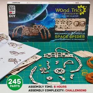 3D wood mechanical puzzle of laser-cut wood pieces that snap together without glue to build a 3D model.  Build, play and display.  The Spider has a wind up so you can make it wiggles its legs and crawl cross the floor.  STEM and building activity.  Kit contains 144 pieces and detailed instructions.<br>
Introducing the Space Spider from the Wood Trick Company. The wood 3D puzzle kit is a highly detailed model combining 2 things that make us wonder:  a spider and SPACE! The mechanical model is ver