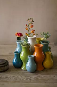 This set of thirteen ceramic bud vases is a wonderful collection for holding your succulents or any other small plant. Each set includes a variety of cheery, yet delicate colors. They look fabulous grouped together but are also a great way to spread some color throughout your home.