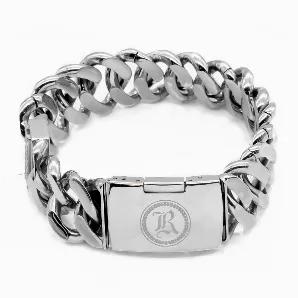 The Stainless Steel ID Tag bracelet will add the cool look of sleek steel to your ensemble. Featuring a nameplate with the True N' Raven brand etched onto it, the Stainless Steel ID Tag bracelet is comprised of a chain of interlocked round, steel pieces, which are brushed on the top and backsides while polished in other areas. Complete with a folded, steel clasp, the Stainless Steel ID Tag bracelet is one awesome-looking piece that will complement any casual outfit. Made of stainless steel; 22mm