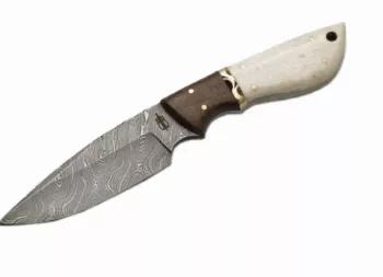 This drop point hunter has a Damascus blade with full tang construction. Blade is 3/16" thick and 1 3/8" deep. Filework on thumbrest. Bolster is walnut and handle is camel bone with brass pins. Lanyard hole in handle. Comes with leather sheath.