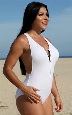 T Back Wet Suit The T Back Wetsuit one piece is an original by UjENA. It has all the style of a sport One Piece with extra high style to show your body! The functional black zipper adjusts to cover as much as you want at the bust. The low cut T-Back and high cut leg will move with your every action, if it be snorkeling or doing laps in the pool. This Wet suit style will bring out your best! The perfect stylish and sporty One Piece! This one piece will bring out your best! Zippered front Wide Str