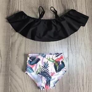 <p>2 piece Girls Bathing suit. Features Light Pink Off the shoulder Ruffle bathing suit top with spaghetti Straps. High Waisted Tropical printed bathing suit bottom.  </p>
<p>Hand Wash, Hang Dry and Do Not Bleach.<br></p>
<p>AL Limited.. The same great quality from AnnLoren, offered for a limited time.</p>