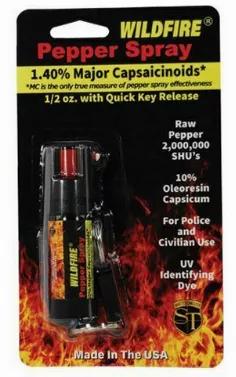 Wildfire 1/2 oz 1.4% MC pepper spray hard case and quick release keychain red. The WILDFIRE(R) PEPPER SPRAY is hot, hot, hot. The Major Capsaicinoids are the true heat measure, WildFire has the hottest on the market at 1.4% Major Capsaicinoids. In addition to causing an attacker pain, The WildFire 10% oleoresin capsicum formula swells the mucous membranes, which makes breathing difficult, and swells the veins in the eyes, causing the eyes to close. It's made from 2,000,000 SHU's of raw pepper an