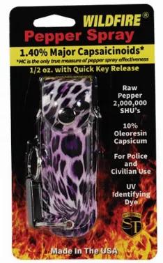 Wildfire 1/2 oz fashion leatherette holster and Quick Release Key Chain leopard black/purple. The WILDFIRE(R) PEPPER SPRAY is hot, hot, hot. The Major Capsaicinoids are the true heat measure, WildFire has the hottest on the market at 1.4% Major Capsaicinoids. In addition to causing an attacker pain, The WildFire 10% oleoresin capsicum formula swells the mucous membranes, which makes breathing difficult, and swells the veins in the eyes, causing the eyes to close. It's made from 2,000,000 SHU's o