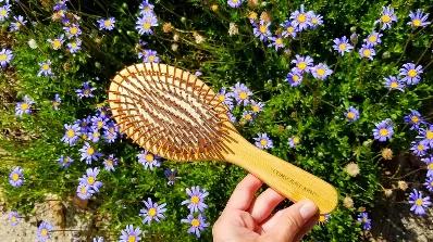 Brushing your hair is not just good for detangling matted hair.
<br>
Brushing your hair massages your scalp, stimulates blood flow which increases hair growth and helps the natural oils from your scalp spread to the rest of your hair, leaving it shiny and strong.
<br>
This beautiful brush is made from bamboo, a renewable fast growing plant and natural rubber from the rubber tree Hevea Brasiliensis. Products made from bamboo have been shown to be either carbon neutral and some even carbon negativ