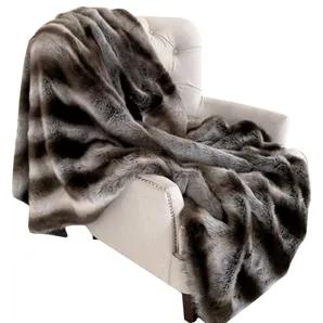If eyes are the windows to the soul, then this decorative throw/blanket is the windows to the design beauty of one's dream. Add a special touch of texture and comfort to your living space with this designer Silver/Gray Chinchilla faux fur luxury throw. Create and enjoy the real look without harming animals!<br> *Handmade In USA<br> *Color: Silver, Gray<br> *Fabric Content: 100% Acrylic<br> *Reversible<br> *Back Side: Matching Solid Color