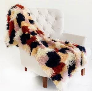 If eyes are the windows to the soul, then this decorative throw/blanket is the windows to the design beauty of one's dream. Add a special touch of texture and comfort to your living space with this designer Fanciful Boho Plush handmade luxury faux fur throw blanket. Create and enjoy the real look without harming animals!<br> *Handmade In USA<br> *Color: Red, White, Blue<br> *Fabric Content: 100% Acrylic<br> *Reversible<br> *Back Side: Matching Solid Color