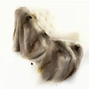 Indulge yourself with cozy warmth and luxurious comfort with this stunning faux fur with a mix of long piles in white, gray and hints of gold. This fox fur is incredibly soft and plush with super soft tan color microfiber backing.<br> Back fabric color: sand<br> *Handmade in USA*