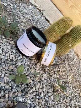 Notes of lavender, musk, amber. Natural beeswax blend of soy, coconut, and RSPO palm oil, sourced in the USA. Black tin jar with lid. Up to sixty hour burn time for a net ten-ounce candle