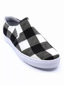 The Gaby 1 is a classic sneaker with an iconic silhouette, lightly padded insole, and lace-up style. Slip on style, black and white plaid canvas sneaker. True to size. 