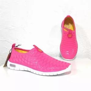 Make a statement in these hot pink sneaker flats. Slip on into style and comfort. Medium width and true to size.