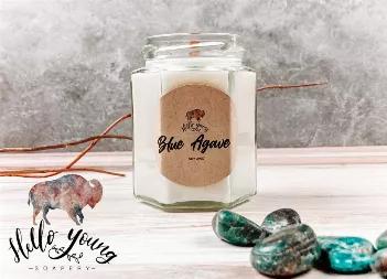 The top notes are exotic citrus, lime oil, grapefruit, cardamom, and red berry. The heart is composed of blue agave flower, sea salt, orchid, geranium, and white lily, and the base unites cocoa, vetiver, cinnamon, musk, and vanilla. Made with 100% soy wax and a wood wick. Comes in clear hexagon glass jar with screw cap.