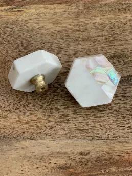 Abalone Shell and Stone Knobs and Pulls. <br> 

We source these from India where they are handmade by artisans. We love them for their fun unique shape &  colors. <br>

Screws are included  with purchase but can easily be replace for a better fitting size. <br>

screw size - 1.5 inch 
