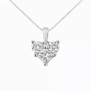 A story of pure elegance, these glamorous pendant showcases brilliant natural diamonds that are set in enduring 10k white gold. A magical look she'll turn to often, this necklace is designed with two round-cut diamonds and one princess-cut diamond in a lovely heart design. With an impressive total diamond weight of 1/2 Carat Total Weight, you can't go wrong with this piece. Comes with a gold box chain that is 18" inches long.