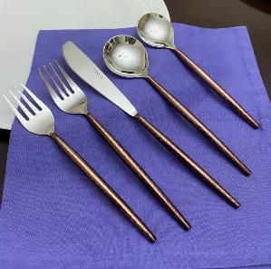 Dinner table should not be plain after your long day. Give an attractive charm to your dining decor with Vibhsa’s luxurious flatware set. Each piece is elegantly handcrafted and no 2 pieces will be alike. Vibhsa experiences you the best flatware designs for your tableware which attracts your guests on a dinner table. Set includes table setting for 4. Set Includes 4 pieces of each: 8" dinner fork, 9" dinner knife, 7.5" tablespoon, 7.5"  Soup spoon, 7" salad fork. This Luxury Flatware will heigh