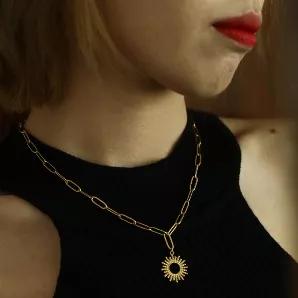 <p>Style: ABIGAIL 21011 Necklace.<br></p>
<p>Blending a contemporary link chain with an ornate star burst pendent, this necklace makes for an eye catching piece. Let them stare.</p>
<p>Crafted from Hand Forged Graded Metal Dipped in Pure 18 Karat Gold. Free of Nickel, Lead and Cadmium. Non-Allergic and will not turn Skin Green.<br></p>
<ul>
<li>Length 16"</li>
<li>Glow in Gold: Luxurious Gold Hue from the Pure 18 Karat Gold Dipping<br>
</li>
<li>Wear to Dress Up or Dress Down</li>
<li>Free Shipp