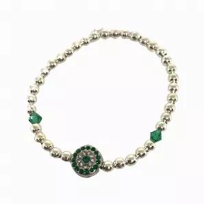 Part of our Holiday '21 Collection:<br>
<br>
Stunning in silver. Stretch cord bracelet strung with silver plated beads showcasing an Emerald and crystal round centered bead. <br> <br>
<br>
Sold in Packs of 5. <br>