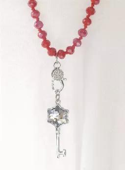 Red crystal knotted multi-layer necklace with Swarovski crystal key pendant and crystal pave' lobster clasp. Knotted strand is one long necklace that can be layered to your liking!