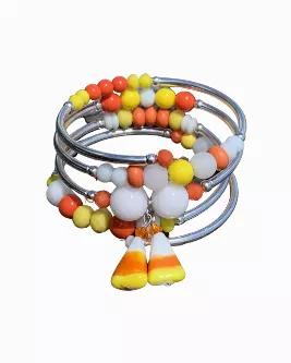 Glass blown candy corn beads dangle from a stone, crystal and glass bead mix wrap bracelet. Polish up the silver plating with silver cleaning cloths if needed.\n\n&nbsp;