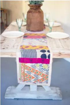 This unique table runner adds a touch of bohemia to any table by using an eclectic range of recycled kantha fabric. Colors and patterns will always vary.