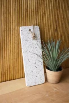Tired of marble, spice it up with our Rectangle Terrazzo Cutting Board!  Beautifully created with a cream finish with touches of greys and browns to accent this piece.  Great to served cheese and crackers on at your next party!
