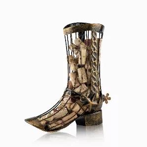 This Boot Was Made For Drinking! It Accommodates Roughly 70 Wine Corks And Looks Good Doing It. Crafted From Sturdy Metal And Finished With A Rustic Bronze Tint, This Cork Holder Is Sure To Charm. Makes A Great Gift For Design-Conscious Wine Lovers. Holds Roughly 70 Corks, Measures 12" H X 10.5" W, Bronzed Stainless Steel, Cage Design With Hang Tag. Store Your Corks In Style - Measuring 12" H X 10.5" W, This Wine Cork Holder Cage Holds Roughly 70 Corks, Which Allows You To Collect Your Favorite 