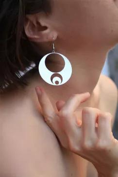 <p><span style="font-weight: 400;">Rael Cohen Jewelry</span></p>
<p><br></p>
<p><span style="font-weight: 400;">Supple, round, lunar shapes that act as a playful reminder to “love yourself to the moon." A circular, weightless drop earring is a piece of moon jewelry that inspires reflection and quiet understanding of the sacred feminine. Choose a moon symbol earring in 24k gold plate or silver to awaken the inner priestess, witch, or healer within. By letting the moon guide your path you will 