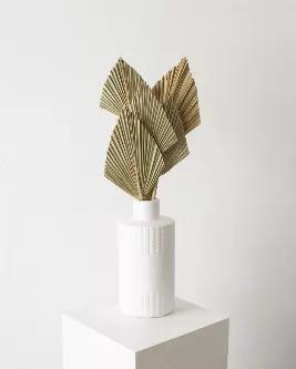 The natural dried Baby Spear Palm leaves picked from the Anahaw Tree and trimmed to size, adds the perfect natural tropical textures to any space. Combine them together with our dried florals or stagger 3 to 5 palms in the same vase to give it some dimension. Please note because these are natural leaves each stem may slightly vary in tones of green/brown and have slight variation in size. Vase not included.