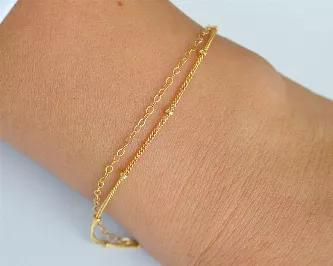 You have just found the dainty double chain gold filled bracelet that has the power to make women feel:<br>
- chic and stylish; <br>
- feminine and elegant;<br>
- unique and fabulous.<br>
Product - details and features:<br>
- 6" bracelet comes with 2" attached extender (6" - 8");<br>
- 14k Gold Filled 1mm satellite chain and 1,6mm cable chain;<br>
- 14k Gold Filled wire wrapped details:<br>
- 14k Gold Filled spring ring closure;<br>
- handmade in California, USA.<br>
This elegant piece handcraft