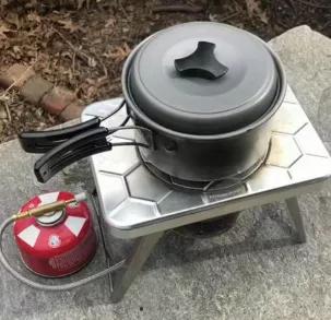 <p>The nCamp Multi-fuel Stove is designed to use wood or gas (with the included Gas Adapter) for cooking, giving you a choice of fuel depending on your use conditions. It has a wide stable base, allowing you to use larger and heavier pots or pans while reducing the chance of tipping. The cooktop provides a place for setting utensils when cooking, while the innovative collapsible combustion chamber and folding legs make it compact to reduce bulk in your pack. In addition to wood and gas, you can 