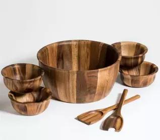 Beautiful, extra large salad bowl comes complete with serving utensils.  Generously sized bowl is perfect for salads, fruits or snacks.  Made from environmentally friendly Acacia wood.  Handcrafted from solid acacia wood, a high-quality hardwood great for culinary applications