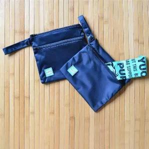 Be prepared on your next dog walk with a solid black TWO-pocket poop bag holder. Use one pocket to drop that full poop bag inside, zipping it up to help zip in the odor--and to hide that saggy poop bag. Use the second zippered pocket for clean bags, hand sanitizer or other essentials.
