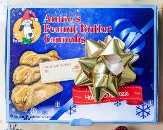 One dozen of our pooch-pleasing peanut butter cannolis boxed in festive winter holiday packaging.