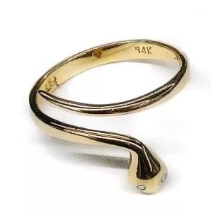 Coveted and reserved for subdued seduction. <br>
14k snake ring in size 8<br>
Band Thickness: 1.0 mm<br>
Weight: .5 grams