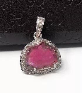 <p>Sterling Silver Natural Pink Tourmaline Slice Pave Diamond Pendant.</p> <p>** HANDMADE PENDANT**<br> SIZE : 25.4mm x 17.25mm x 6.5mm ( including Bail)<br> GEMSTONE : NATURAL PINK TOURMALINE SLICE<br> ORIGIN : AFGANISTHAN<br> TREATMENT : NO TREATMENT<br> METAL : 925 STERLING SILVER<br> DIAMOND WEIGHT : 0.31 CT's<br> DIAMOND COLOR. : K COLOR<br> DIAMOND : GENUINE DIAMONDS<br> SETTING : PAVE SETTING<br> **All Measurements are close approximations**</p> <p>This exclusive Beautiful Handmade Genuin